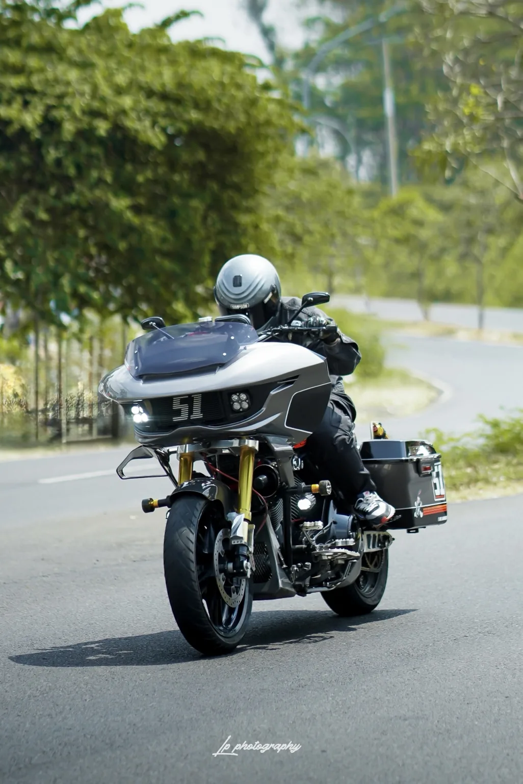 Performance bagger being ridden on a road